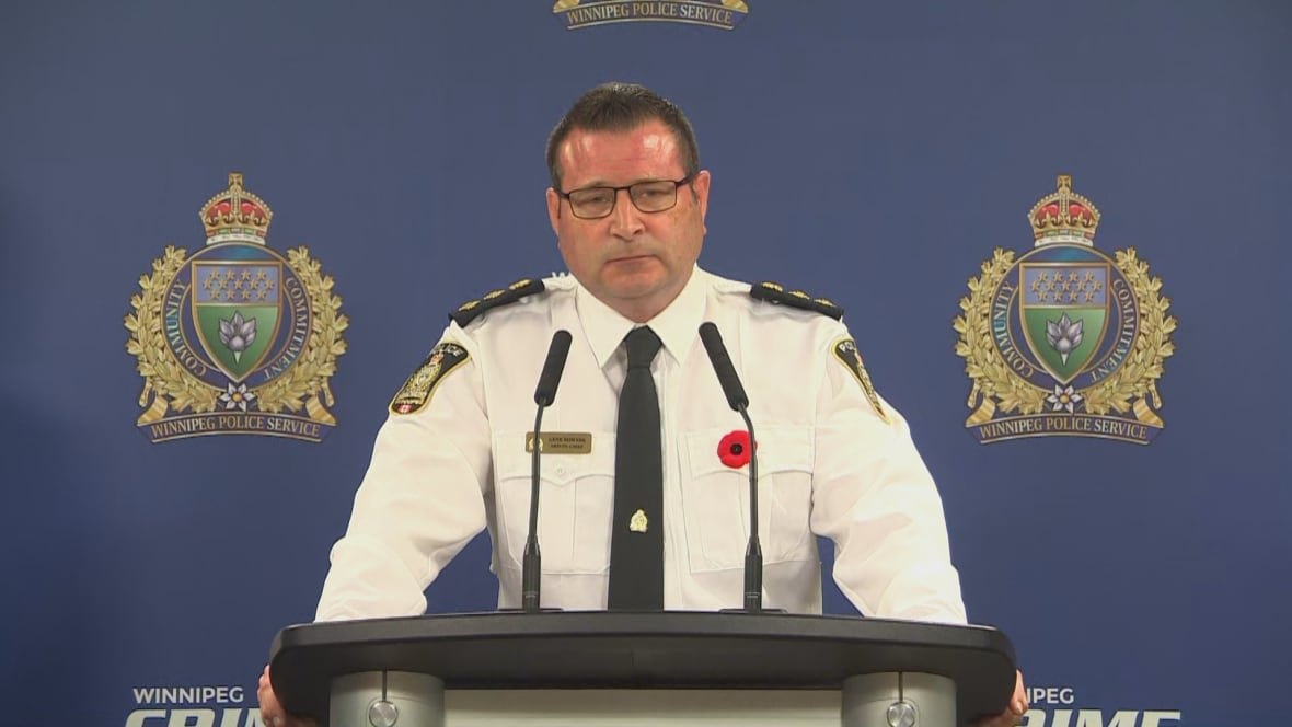 Photo of Gene Bowers at a recent press conference. HIs face is very red.
